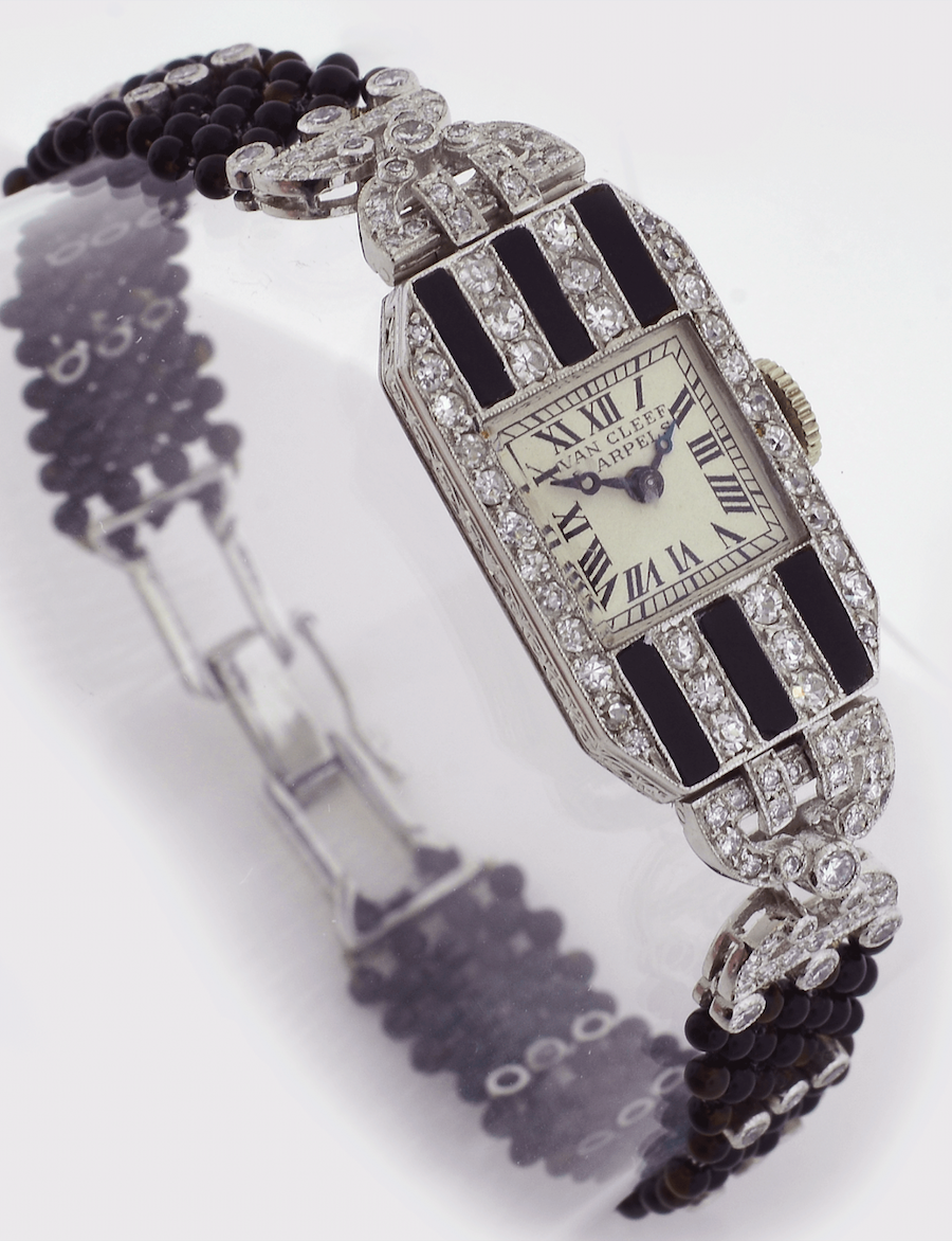 Vintage Swiss ladies wrist watch by Van Cleef & Arpels, in Art Deco platinum and onyx case restored with original dial and 18 jewel movement, modern bracelet with original hardware, circa 1930. Offered by Solvang Antiques.