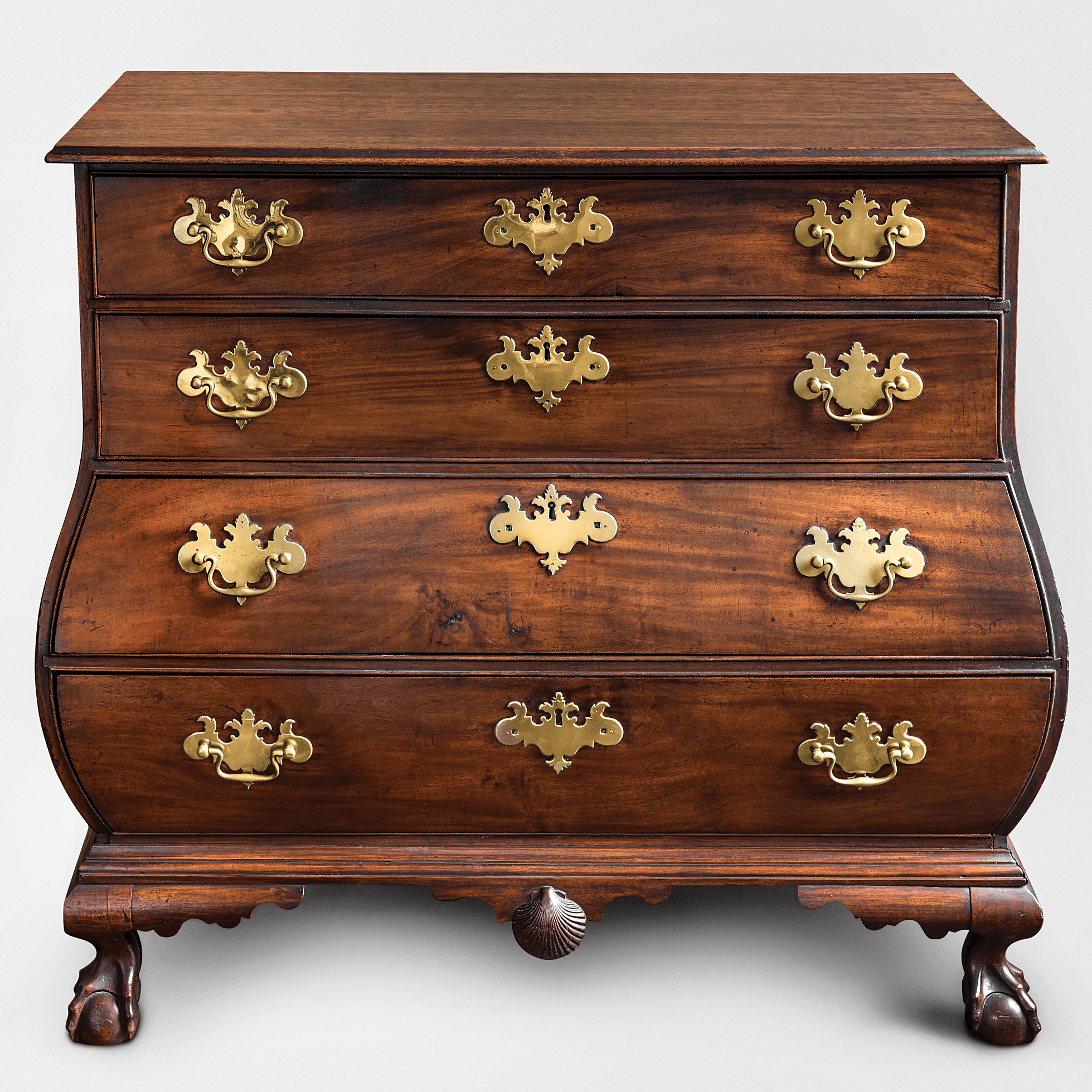 Fig. 9: Attributed to the shop of Nathaniel Gould, Bombé Chest of Drawers, 1781. Mahogany and white pine. H. 36⅛, W. 39, D. 21⅜ inches. Courtesy, Historic New England, Boston: Gift of Mrs. Charles F. Batchelder, Jr. (1984.21). Photography by Gavin Ashworth.