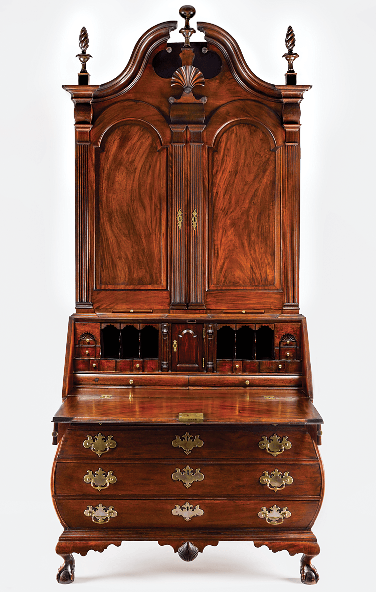 Fig. 12: Attributed to the shop of Nathaniel Gould, the Cabot Family Bombé Desk-and-Bookcase, about 1765. Mahogany and white pine. H. 96⅛, W. 44⅛, D. 22¾ inches. Private collection. Photography by Gavin Ashworth.