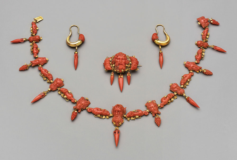 Suite of coral jewelry, Italy (Naples), ca. 1850. Gold, coral. Necklace: 23⁄16 x 2⅜ x 9⁄16 inches. Brooch: 215⁄16 x 1⅛ x ⅜ inches. Earrings: 18½ x 2⅜ x ⅜ inches. The Elizabeth Day McCormick Collection, 1943 (43.211a-d).
