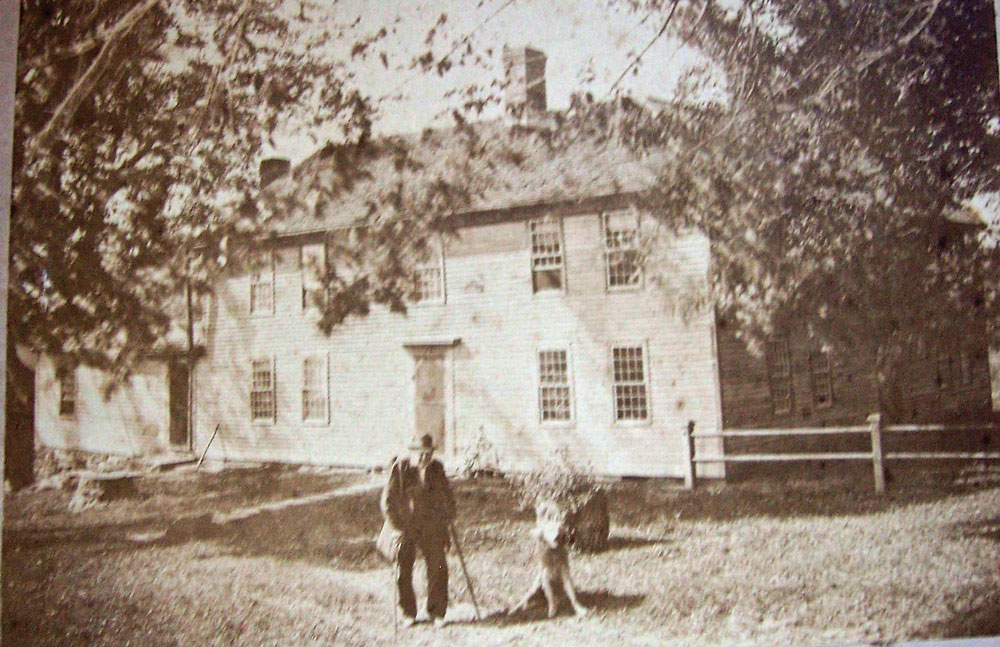 Fig. 10: Photograph ca. 1890 of Col. Horace Sabin (1810–1894) in front of the Esther Grosvenor house, Pomfret, Connecticut. Col. Horace Sabin was a descendant of William Sabin, a founder of Woodstock and Pomfret. Horace married Emily Grosvenor and stands in front of his father-in-law’s house, the Esther Grosvenor house. Private collection.