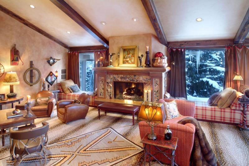 A mosaic fireplace is the at the heart of the living room. Photo by Fred Fuhrmeister of Time-Frame Images.