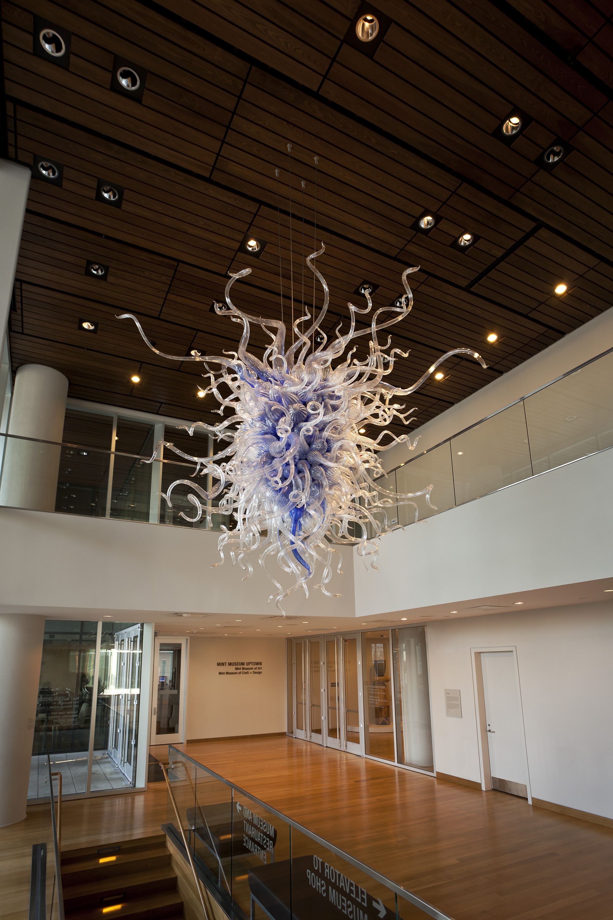 Dale Patrick Chihuly (American, 1941-). Royal Blue Mint Chandelier, 1998, handblown glass, steel. Museum Purchase: Funds provided by Bank of America, Lisa S. and Dudley B. Anderson, Leslie and John Culbertson, Patty and Bill Gorelick, Deidre and Clay Grubb, Rochelle T. Grubb, Interstate Johnson Lane with Michael E. Blair and Robert A. Jones, Debbie and Pat Phillips, Kenneth R. and Ruth C. Samuelson, Nelson Schwab, III, Marc and Mattye Silverman, Bill and Pat Williamson, and Anonymous Donor in memory of Amy Dodds Wilson. Collection of The Mint Museum, Charlotte, North Carolina.