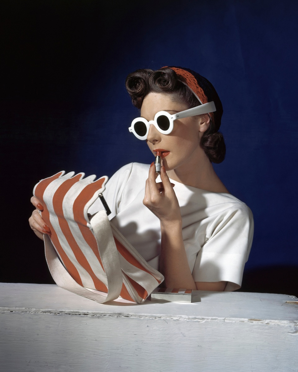 HORST P. HORST Muriel Maxwell, Ensemble by Sally Victor, Bag by Paul Flato, Sunglasses by Lugene, 1939. Courtesy of Robert Klein Gallery.
