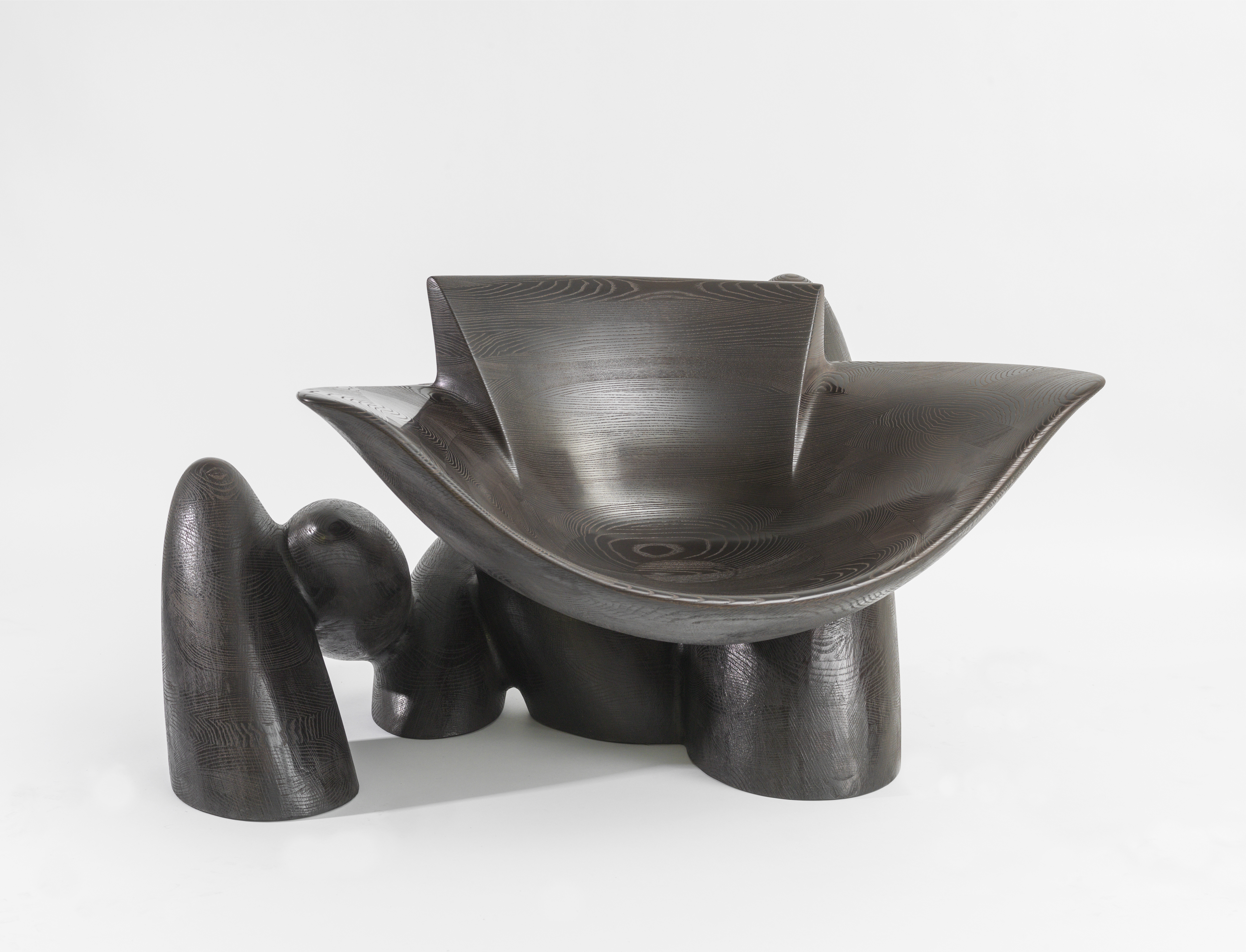Captain's Chair, 2013, Stained Ash, 29 x 54.5 x 43 inches. Courtesy of Wendell Castle and Friedman Benda. Photography: Adam Reich.