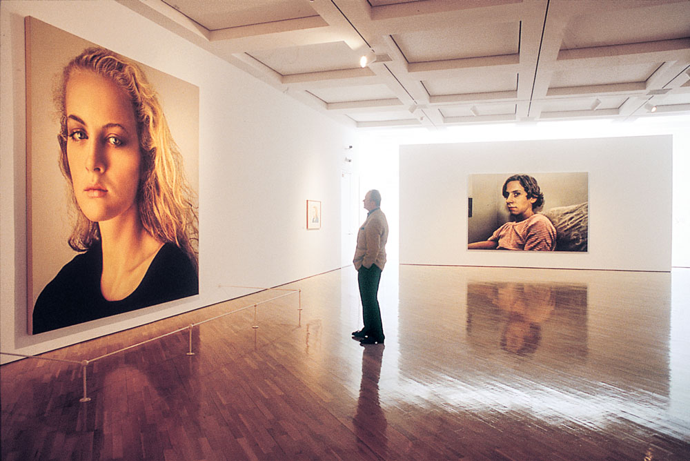 Installation of Franz Gertsch’s (Switzerland, b. 1930) Johanna II, 1985–1986 (left wall). Tempera on unprimed cotton, 129⅞ x 114⅛ inches. Also, Irene IX, 1982. Watercolor on paper (to right of Johanna II); and on facing wall, Luciano 2, 1976. Acrylic on unprimed cotton, 92-1/8 x 136-1/4 inches. Photography by Robert Russo.