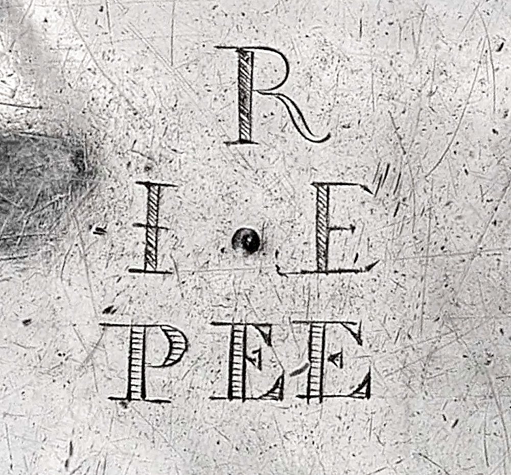 Fig. 10: Detail of initials on base of “IB” marked teapot shown in fig. 8, left.