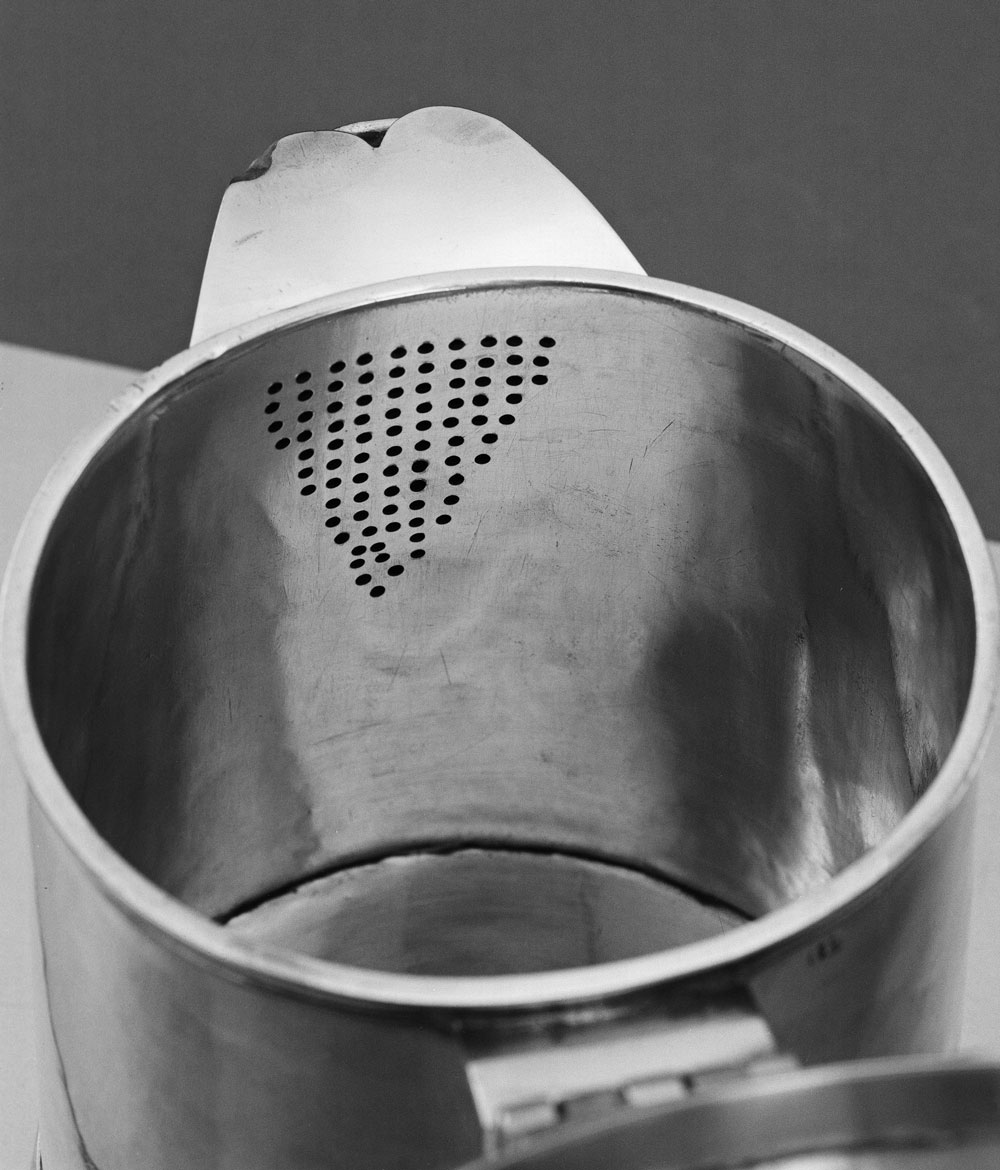 Fig. 6: Circa-1964 photograph of Jacob Gerritse Lansing tankard shown in fig. 1, right, showing interior of added spout.