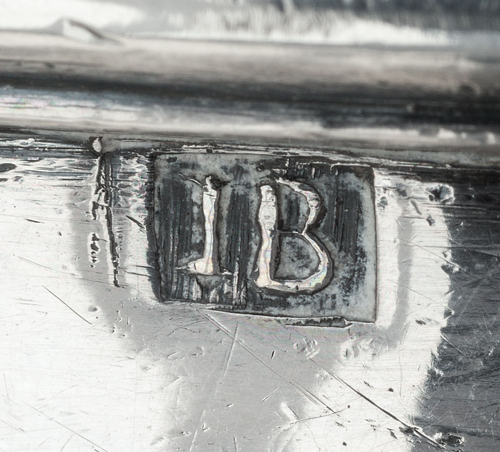Fig. 9: Detail of unidentified “IB” mark on teapot shown in fig. 8, left.