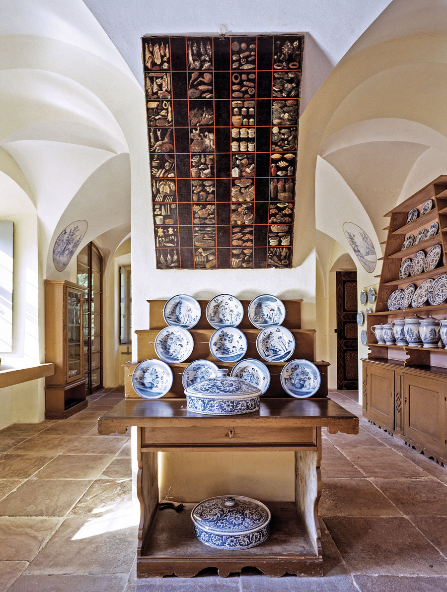 Fig. 6: Sideboard and painting of a shopping list located in the former show kitchen on the ground floor. The Margravine used this kitchen to impress her guests with her collection of tableware as well as to display the meals being prepared. Photography by Landesmedienzentrum Baden-Wuerttemberg.