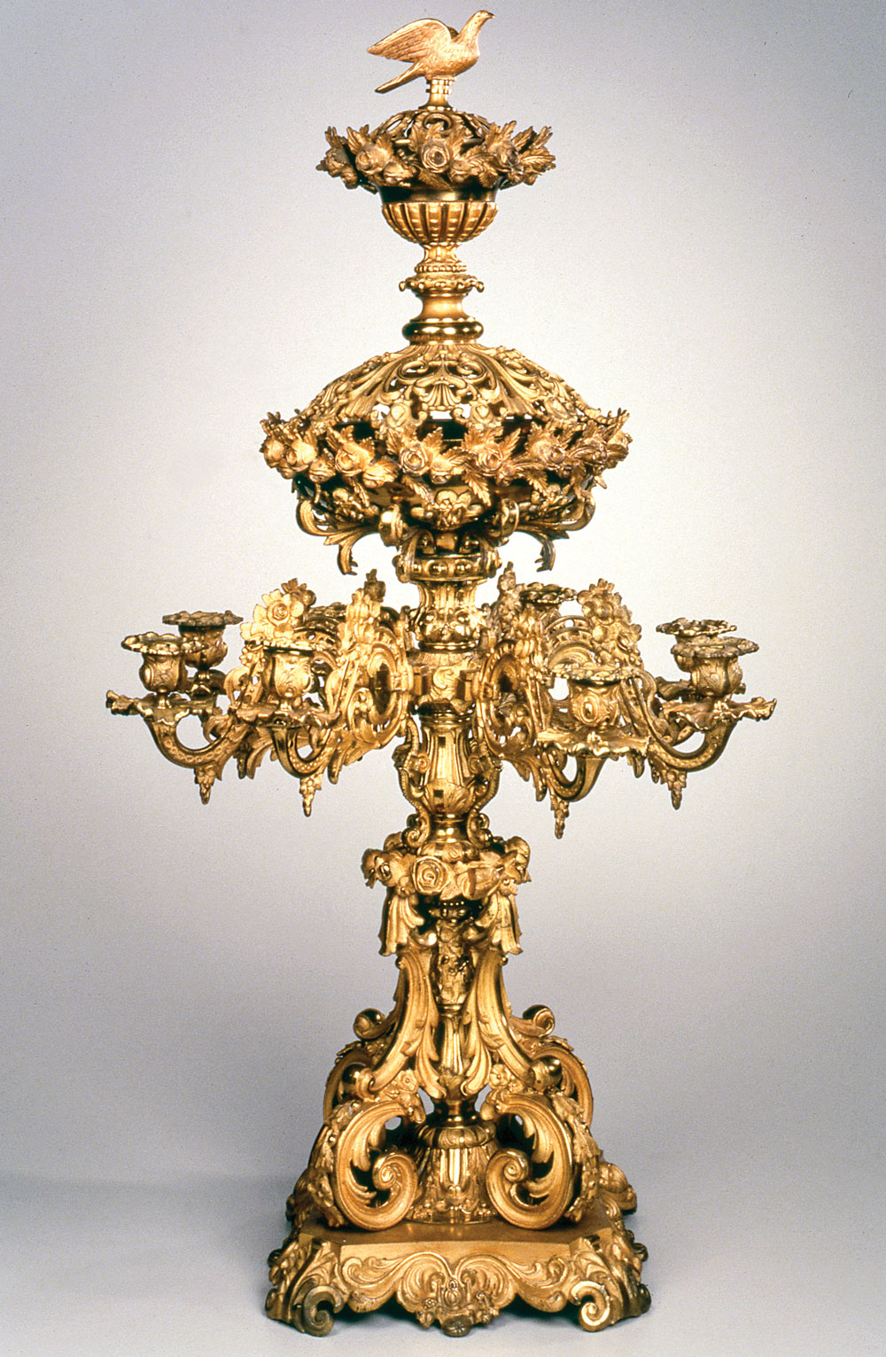 Fig. 5: Eight-arm candelabrum made by Cornelius & Baker, Philadelphia, ca. 1853. Gilt brass, iron. H. 32 in., Diam. 18¼ in. This candelabrum serves alternately as a centerpiece by removing the candle arms and pierced cover to the bowl above the arms. Courtesy Brooklyn Museum.