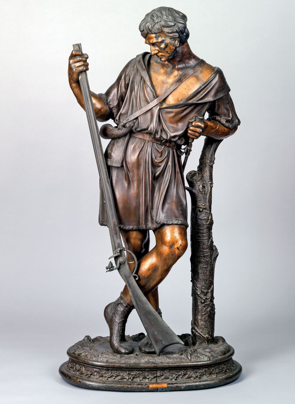 Fig. 9: The Hunter, by Cornelius & Baker, Philadelphia, ca. 1858–1859. Bronzed and gilt zinc. H. 41 in. The original design was created by William H. Rinehart (1825–1874) and cast in bronze by Cornelius & Baker. It stands to the proper right side of a monumental clock installed in the Hall of the House of Representatives in the United States Capitol building. Subsequently, Cornelius & Baker made a few copies in bronzed and gilt zinc like this one for general sale. Private collection.