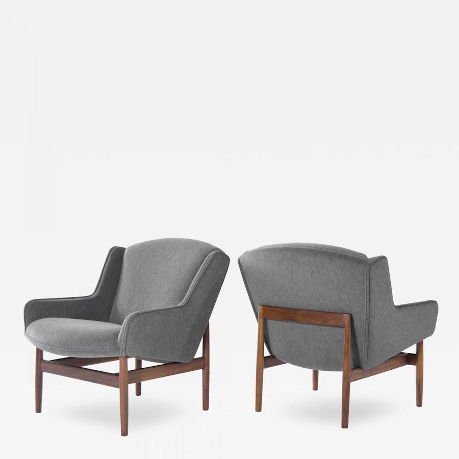 Stunning pair of lounge chairs, newly recovered in grey alpaca. Sculptural teak base fully restored. Designed by Jens Risom, circa 1950s. Offered by Stamford Modern.
