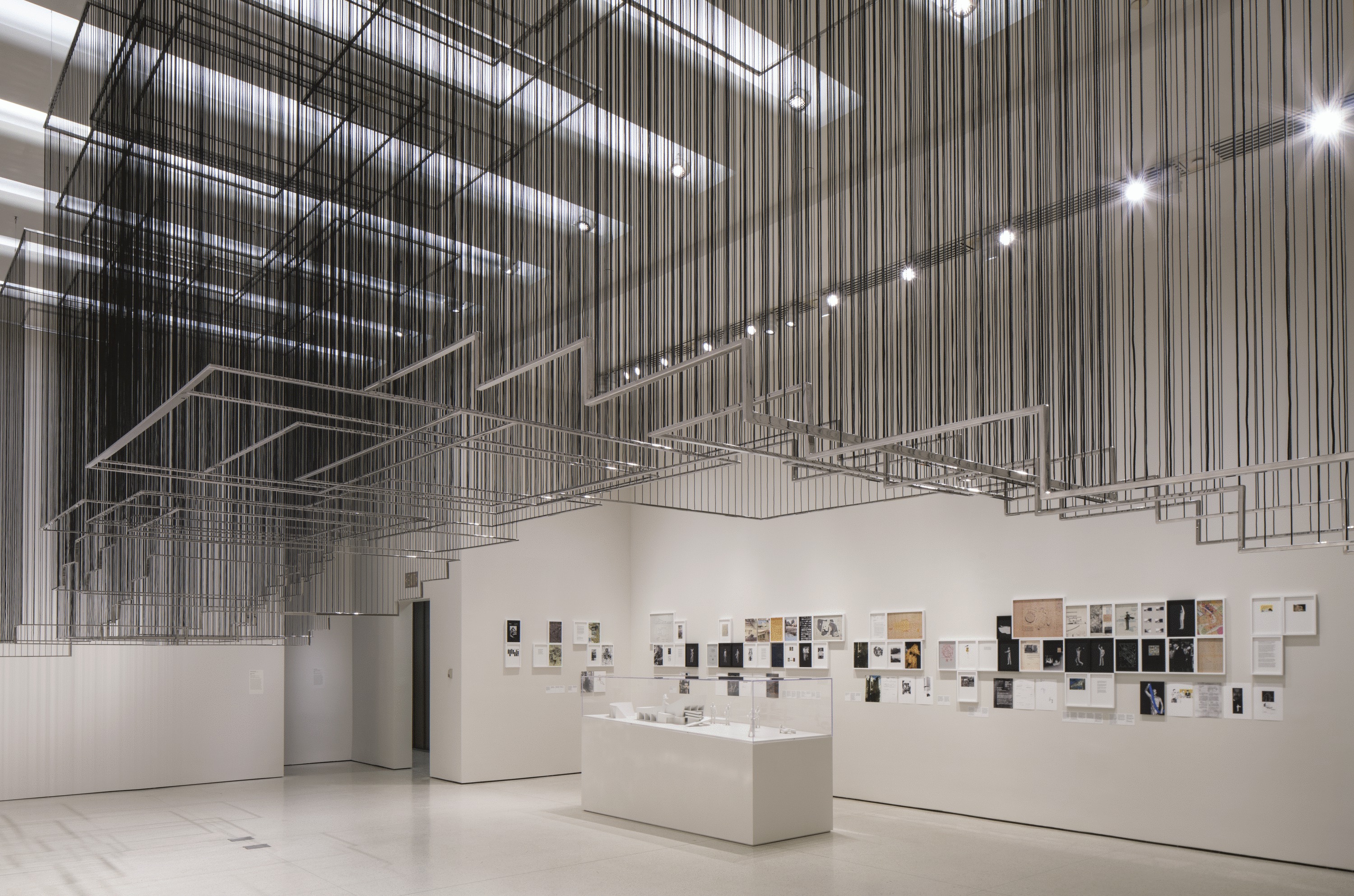 Installation view of Flying Carpets by Nadia Kaabi-Linke in But a Storm Is Blowing from Paradise: Contemporary Art of the Middle East and North Africa, Solomon R. Guggenheim Museum, 2016. Image courtesy of Wikimedia Commons.
