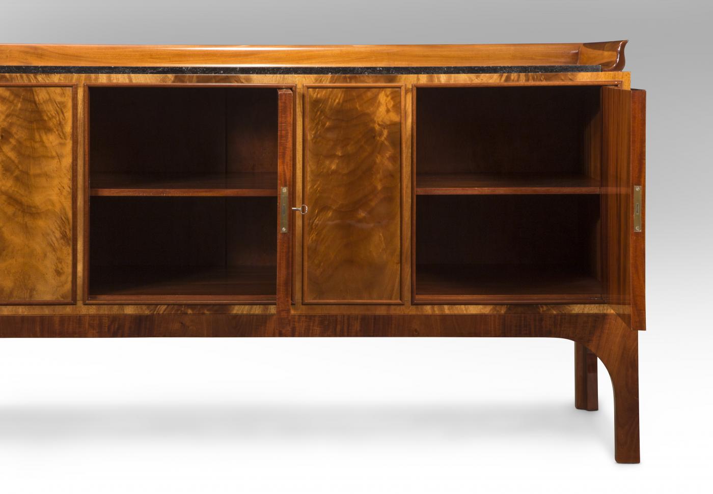 An Important Cuban Mahogany Cabinet, Kaj Gottlob for AJ Iversen, 1929. Cuban Mahogany, Marble, W. 77.5, 36.25, D. 23.25 inches. Offered by H.M. Luther.