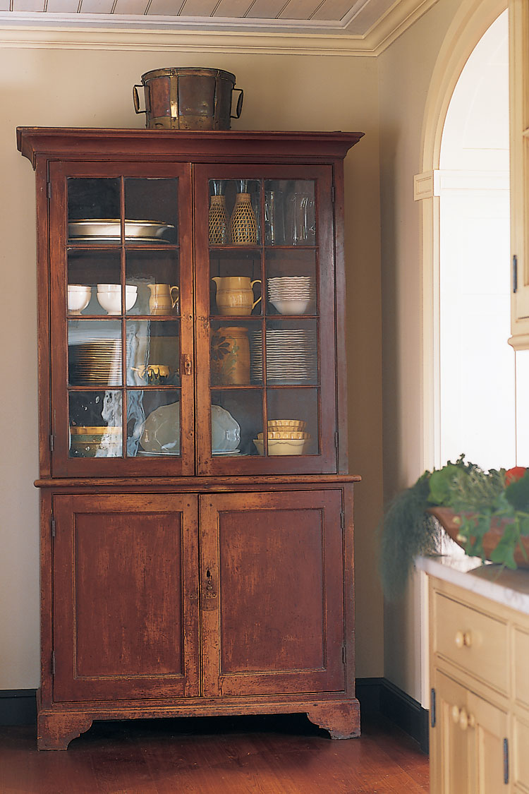The eighteenth-century Virginia cupboard was made for Bowling Green, the home of the Hoomes family in Caroline County, and has an untouched surface.