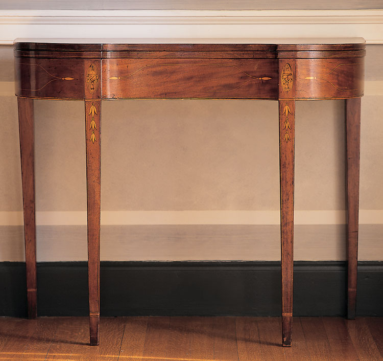 A Boston card table attributed to John and Thomas Seymour.