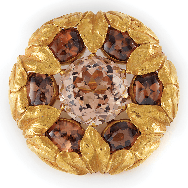 Fig. 7: Brooch designed by Louis Comfort Tiffany (1848–1933), Tiffany & Co. (founded 1837), ca. 1910. Gold, pink topaz, brown cabochon topaz. Collection of Susan B. Kaplan.