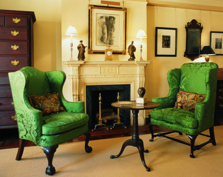 “If I could collect furniture from only one time and place, it would be colonial Newport,” says Nathan. “Our Goddard tea table is very simple, no carving, three pad feet and an ionic column. It is so perfectly proportioned. I have owned it for twenty-five years and every time I look at it I get a charge.” Also illustrated is a New York chest-on-chest of the type made by Samuel Prince and Thomas Burling, New York and Boston easy chairs (on the left and right respectively), engraved New York andirons, and an Irving Penn still-life photograph of cigarette butts. Photography by Celia Pearson.