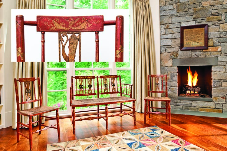 The suite of paint-decorated seating furniture in the master bedroom includes two side chairs and a small settee that are in remarkable original condition. While painted chairs were made in many urban centers, these most resemble those from Portsmouth, N.H, circa 1810. The American geometric hooked wool floor rug dates to the late nineteenth century.
