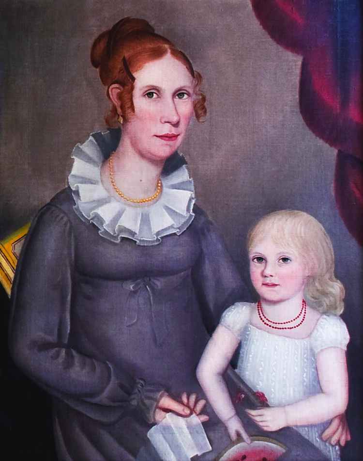 In the hall and opposite the Maentel family group hang two portraits by Ammi Phillips, that of a Mrs. Robinson, circa 1819 (not seen here), and a portrait of Mrs. William Northrop Bentley and her daughter, Louisa, painted circa 1815–1818. Few double portraits by Phillips have been found, and the daughter holding a slice of watermelon is a show stopper. Louisa was an adult when her husband, Edwin Griggs, ran off to join the Gold Rush in 1848; she never saw him again. It is details like this that make the portraits more personal and draw the wife to them, each becoming part of an extended family.